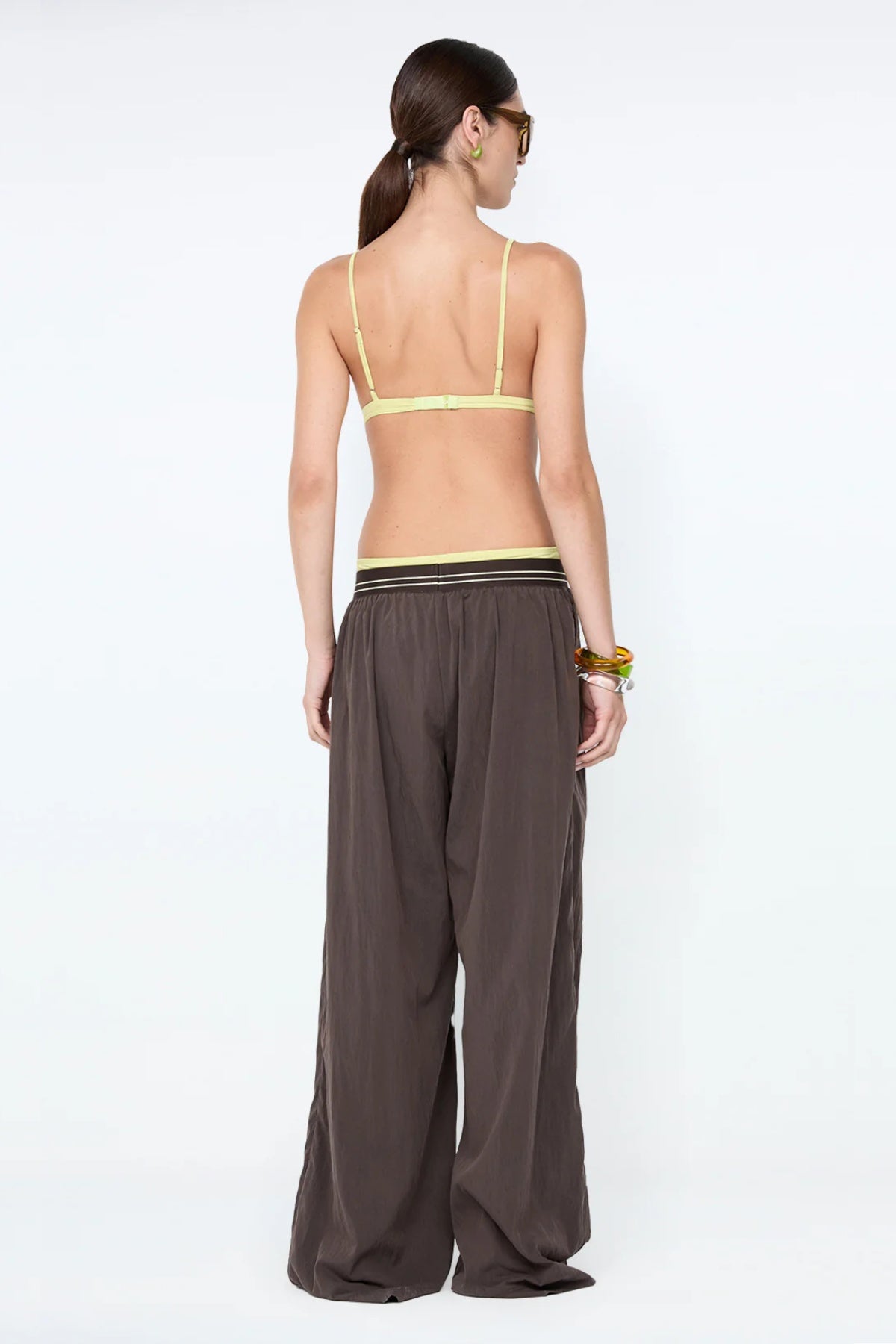 Jerri Wide Leg Pant by Bec + Bridge, a lightweight nylon pant with elastic waistband and wide-leg silhouette for effortless, relaxed sophistication.