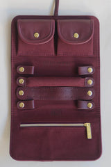 Jewellery Roll Plum by Avant Studio, cross-hatch faux leather with organized pouches. Perfect for stylish travel and gifting.
