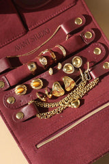 Jewellery Roll Plum by Avant Studio, cross-hatch faux leather with organized pouches. Perfect for stylish travel and gifting.