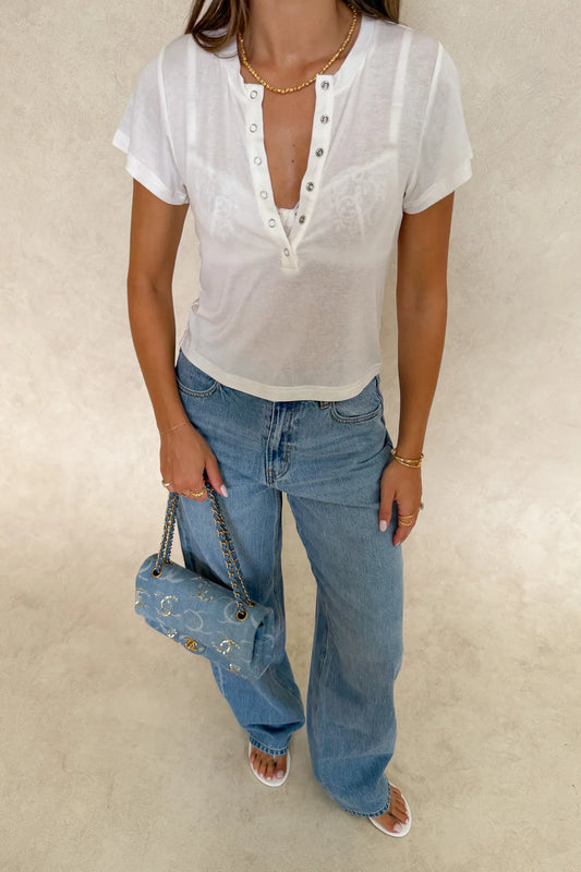 Jules Baby Tee by Sneaky Link – a soft fitted henley tee with ribbed neckline and stretch. Perfect for easy everyday layering.