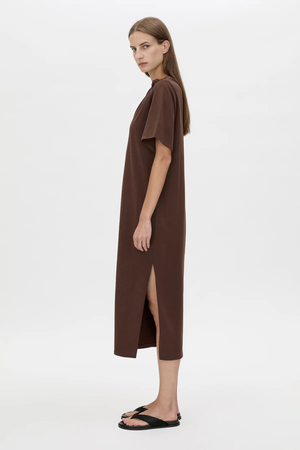 Juno Knot Tee Dress by Camilla and Marc — a chocolate cotton maxi with an asymmetric cut-out and draped knot detail for modern everyday wear.