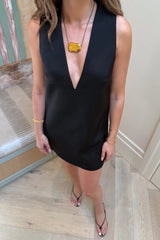 Kayla Mini Dress Black by Sneaky Link – a structured mini with deep V neckline and sleek fit. Perfect for day-to-night styling.