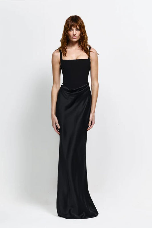 Keanna Gown in Black by Effie Kats, a structured square-neck gown with a draped cowl waist, blending crepe and satin for elegant eveningwear.