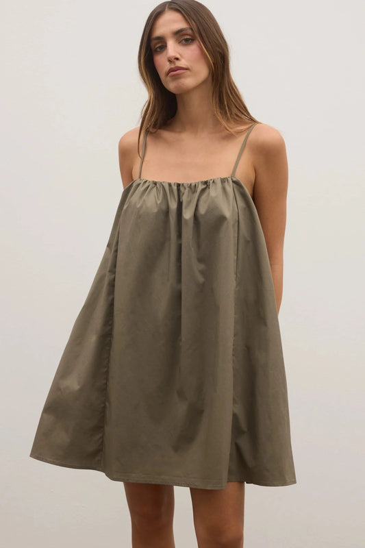 Kerrie Mini Dress in Ash by Bayse, a breezy cotton A-line mini with gathered neckline and pockets, perfect for summer days.