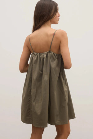 Kerrie Mini Dress in Ash by Bayse, a breezy cotton A-line mini with gathered neckline and pockets, perfect for summer days.