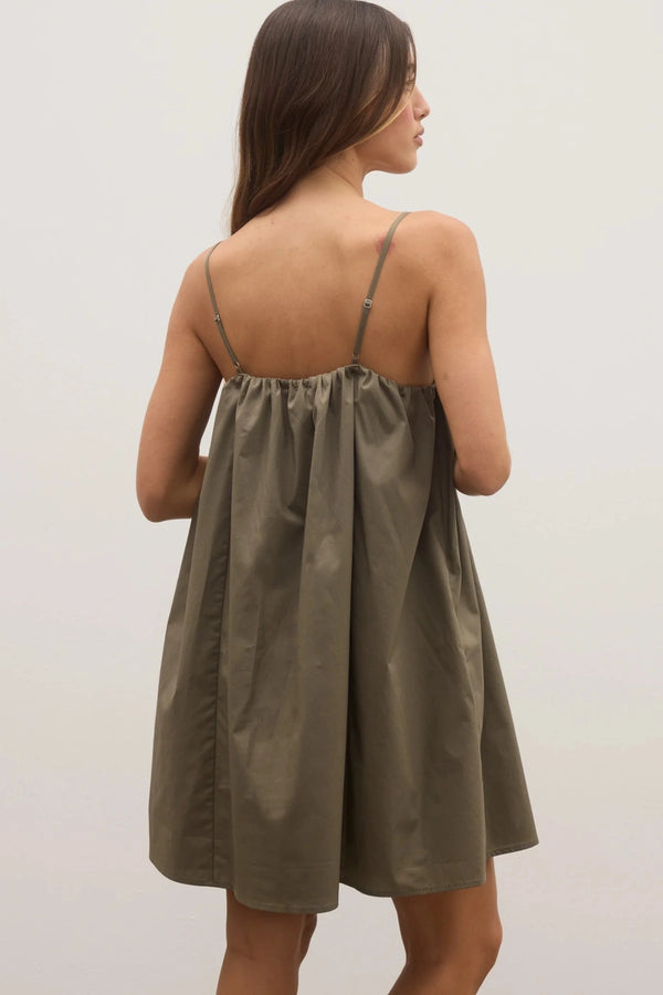 Kerrie Mini Dress in Ash by Bayse, a breezy cotton A-line mini with gathered neckline and pockets, perfect for summer days.