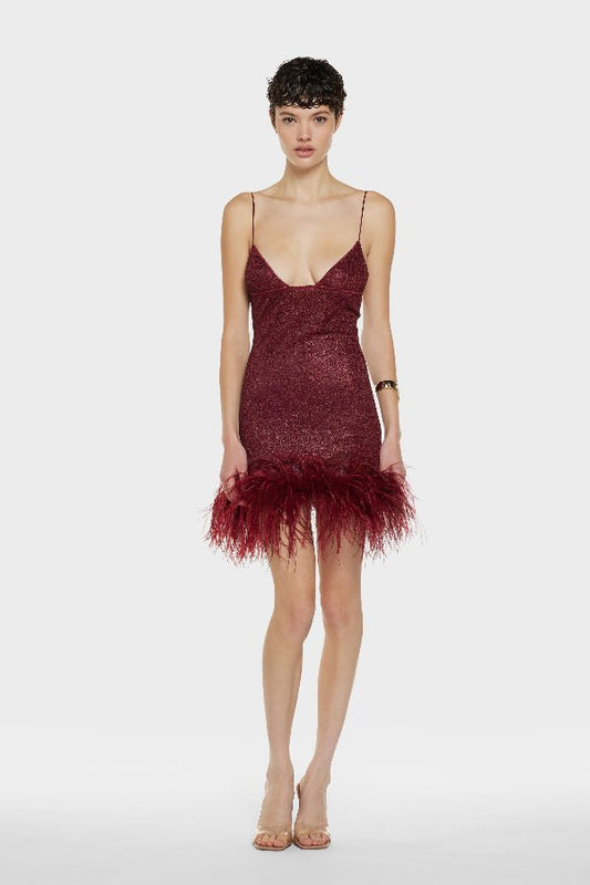 Lumiere Plumage Short Dress Burgundy by Oséree – Trendy metallic mini with deep V neckline and real ostrich feather trim, perfect for glamorous evenings and standout celebrations.