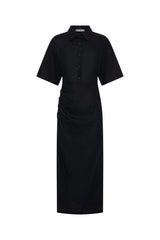 Lefka Midi Dress Black by Sneaky Link – A breathable 100% linen midi with button-front and flattering tucks, offering relaxed elegance perfect for sunny days and casual outings.