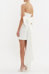 Lia Strapless Mini Dress Ivory by Rebecca Vallance – A corset mini with a bow-back and bonded crepe finish, perfect for modern bridal moments and elegant celebrations.