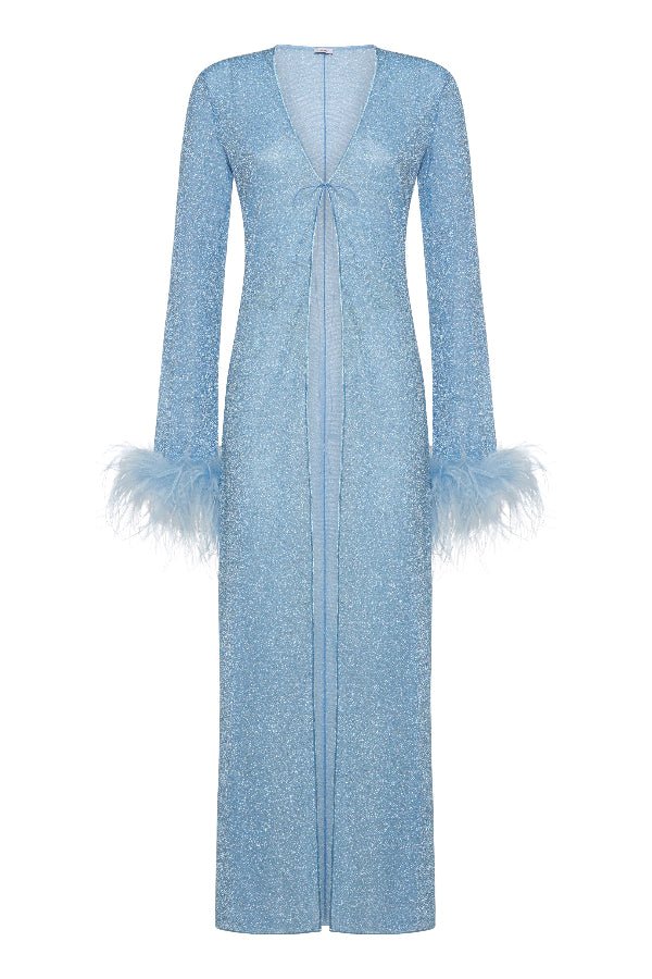 Lumiere Plumage Long Kaftan Crystal by Oséree – Trendy shimmering metallic kaftan with dramatic real ostrich feather cuffs, perfect for glamorous resortwear and unforgettable moments.