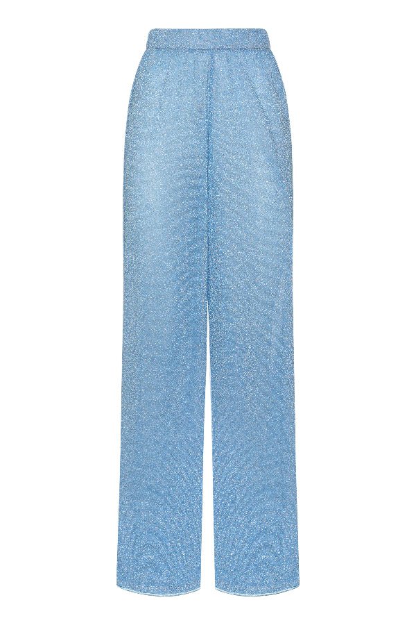 Lumière Pants Crystal by Oséree, elegant straight-leg pants in shimmering crystal blue metallic fabric. Lightweight with an elastic waistband, perfect for relaxed resort or evening wear.