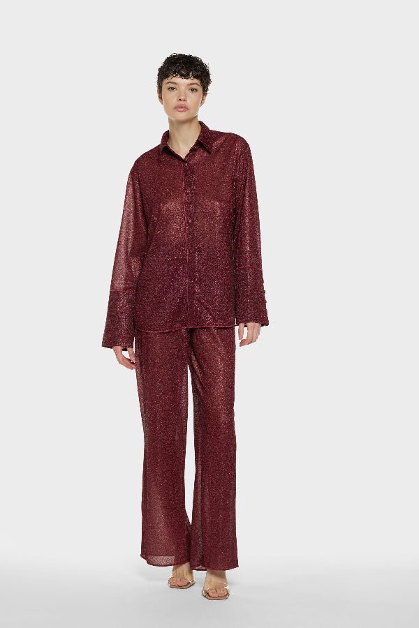Lumière Pants Burgundy by Oséree, luxurious straight-fit pants in rich burgundy metallic fabric. Lightweight with an elastic waistband, perfect for day-to-night elegance.