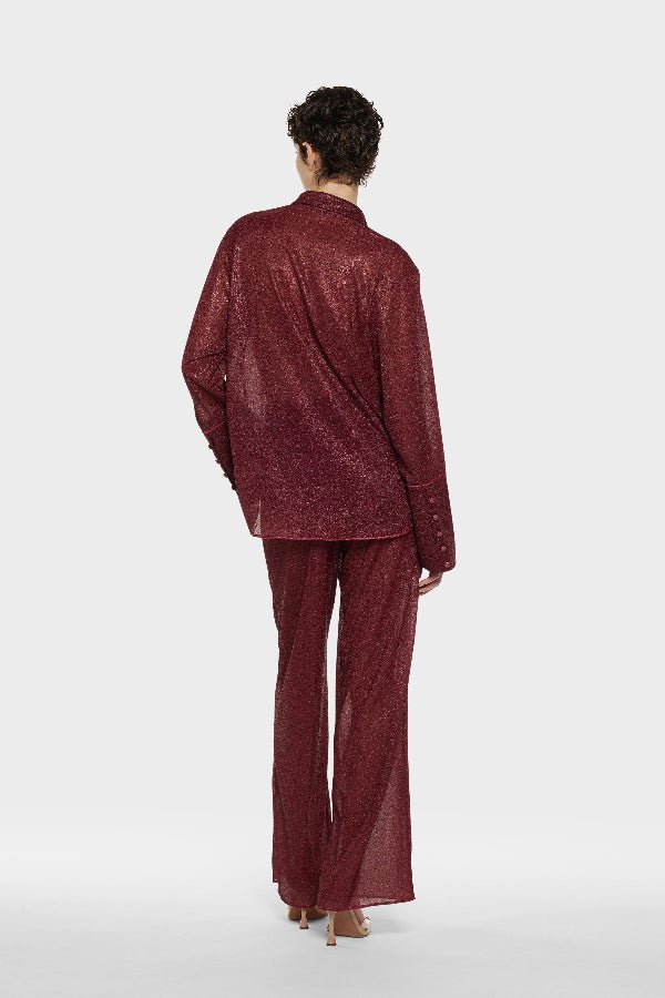 Lumière Pants Burgundy by Oséree, luxurious straight-fit pants in rich burgundy metallic fabric. Lightweight with an elastic waistband, perfect for day-to-night elegance.