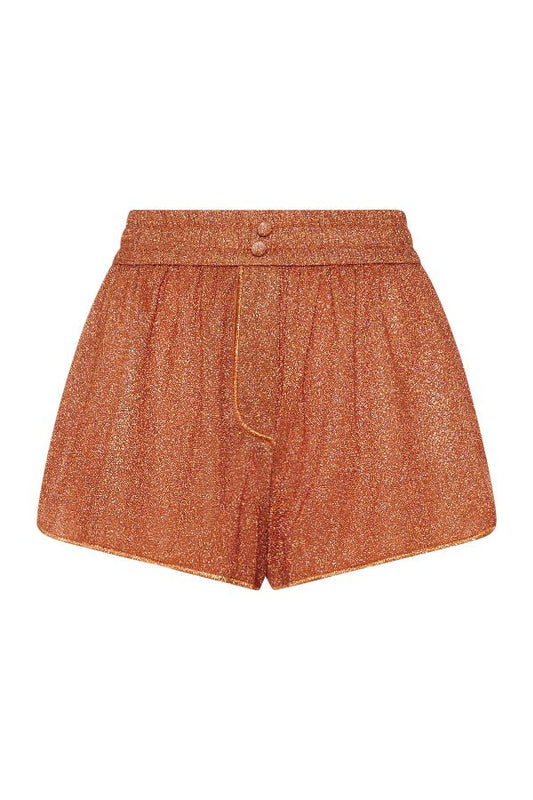 Lumière Shorts Orange by Oséree — Tailored metallic shorts with a vibrant shimmer finish. Sleek, playful, and perfect for resort or evening wear.