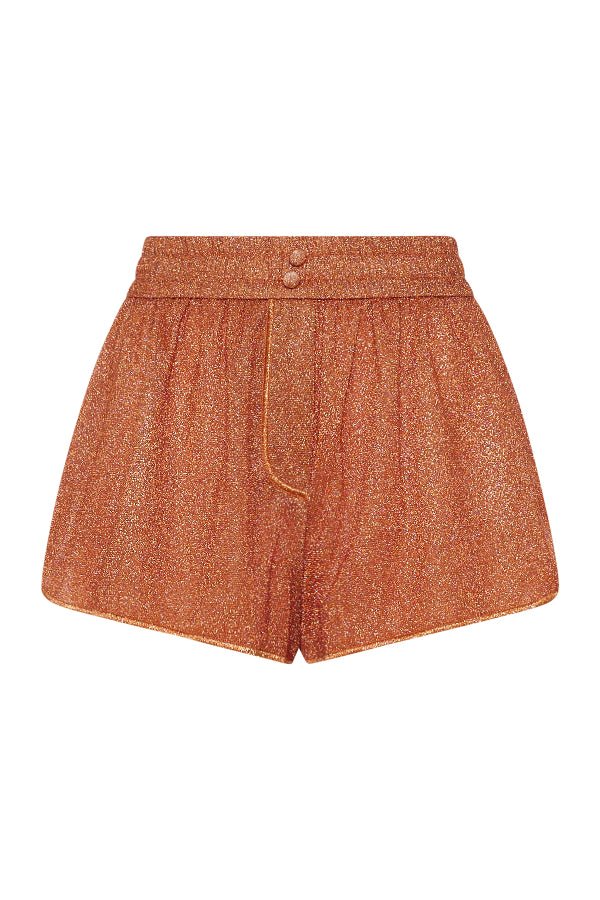 Lumière Shorts Orange by Oséree — Tailored metallic shorts with a vibrant shimmer finish. Sleek, playful, and perfect for resort or evening wear.