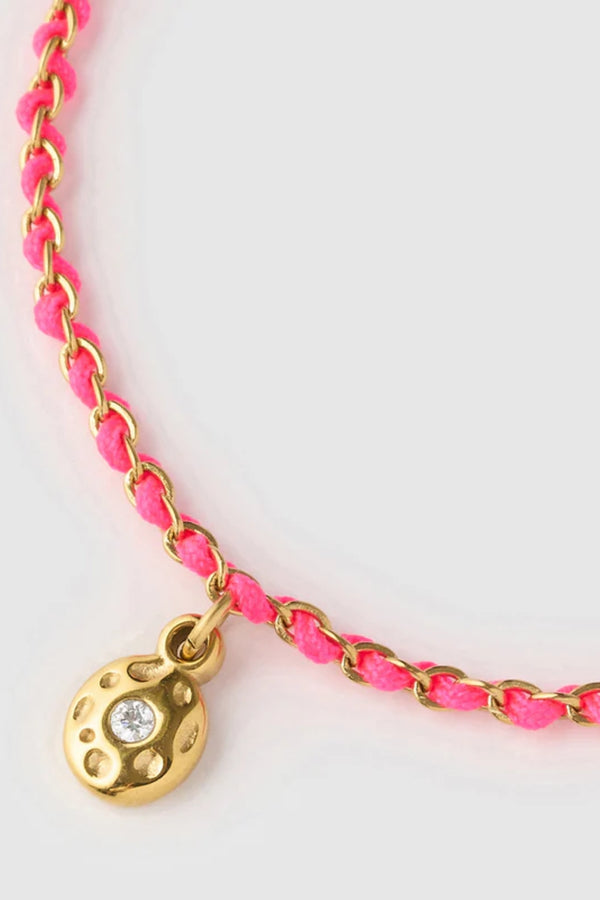 Lacey Bracelet Flamingo by Arms of Eve, colourful friendship-inspired bracelet with pink rope and zircon charm for playful golden summer style.