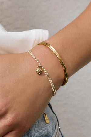 Lacey Bracelet Vanilla by Arms of Eve, minimalist rope bracelet with zircon charm in soft vanilla tones for a golden, playful summer touch.