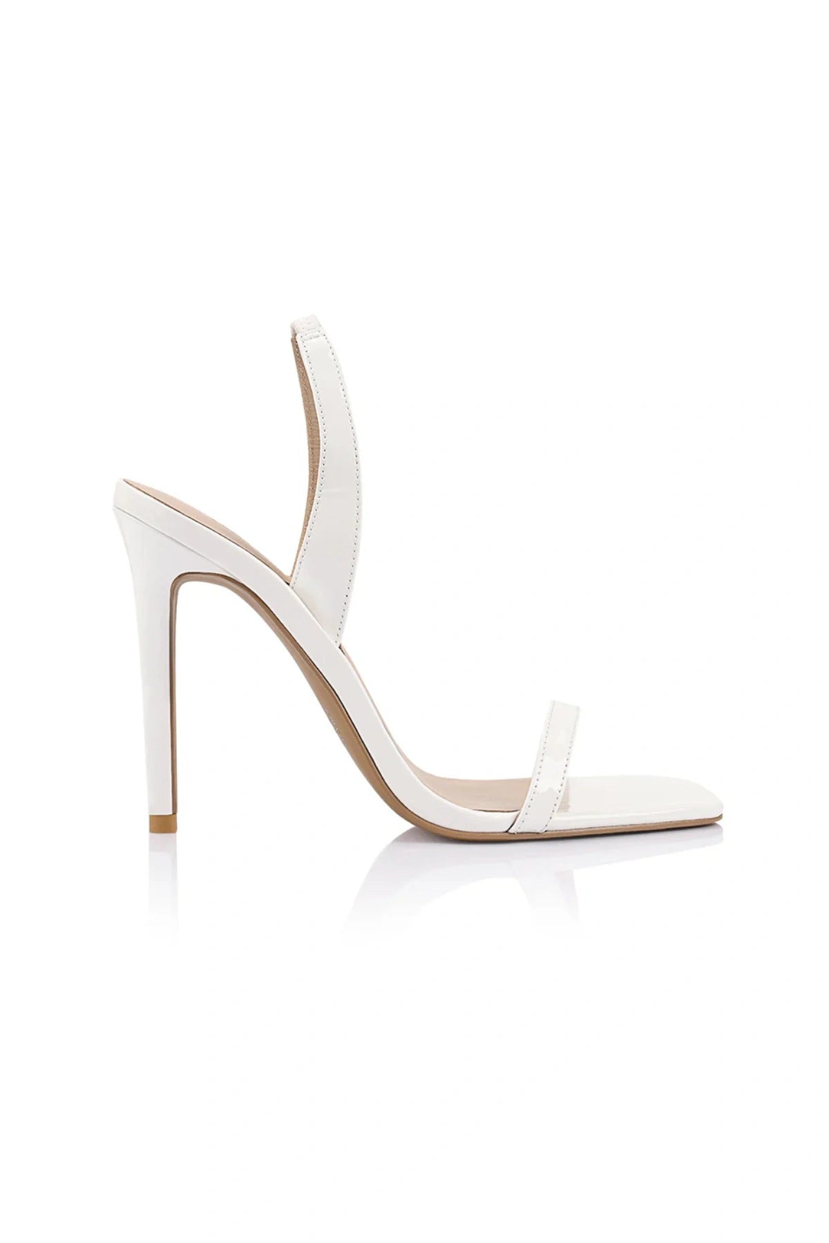 Lana Wilkinson Cassidy Sandal in white patent leather with slim stiletto heel and squared-off toe, perfect for party or summer wear.