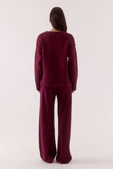 Lane Plunge Sweater Blackberry by Sovere, knit sweater with deep v neckline and relaxed fit. Perfect for cozy everyday wear or off duty looks.
