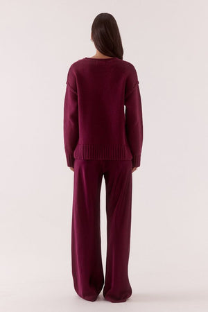 Lane Plunge Sweater Blackberry by Sovere, knit sweater with deep v neckline and relaxed fit. Perfect for cozy everyday wear or off duty looks.