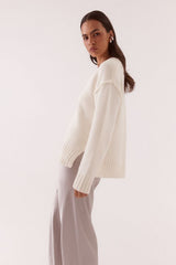 Lane Plunge Sweater Cream by Sovere, knit sweater with deep v neckline and relaxed fit. Perfect for cozy layering or everyday styling.
