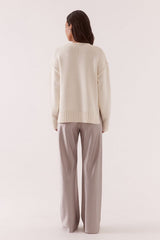 Lane Plunge Sweater Cream by Sovere, knit sweater with deep v neckline and relaxed fit. Perfect for cozy layering or everyday styling.