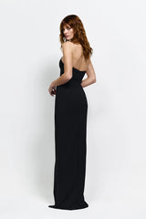Lani Gown in Black by Effie Kats, a strapless floor-length stretch gown with curved neckline, cinched waist, and daring front split for statement elegance.