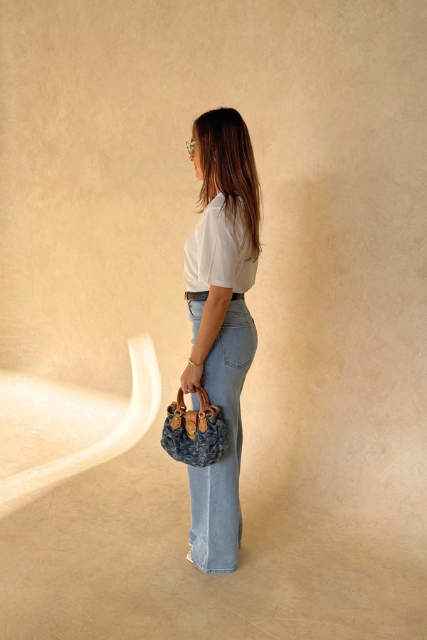 Layered Tee in White by Sneaky Link, 100% cotton with a relaxed fit and layered neckline detail. Perfect for elevated casual dressing.
