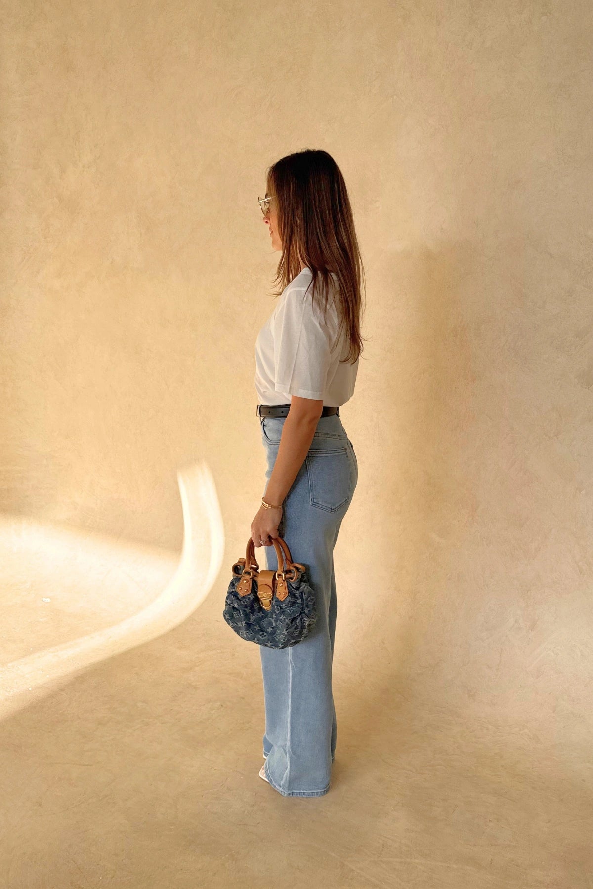 Layered Tee in White by Sneaky Link, 100% cotton with a relaxed fit and layered neckline detail. Perfect for elevated casual dressing.
