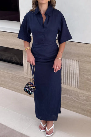 Lefka Midi Dress Navy by Sneaky Link – a linen midi with ruched waist and puff sleeves. Perfect for effortless event styling.