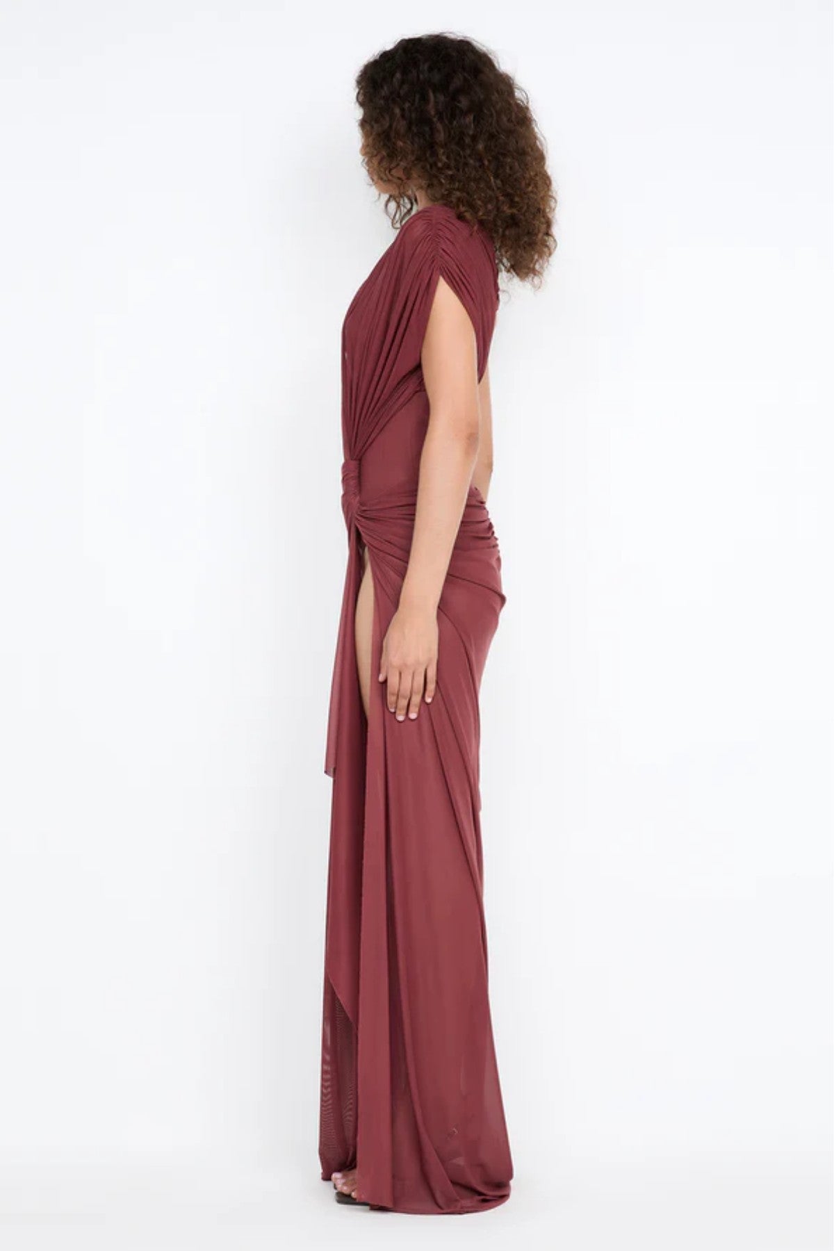 Leia Drape Maxi Dress by Bec and Bridge — a rust mesh gown with a draped twist overlay, front split, and train, perfect for formal events.
