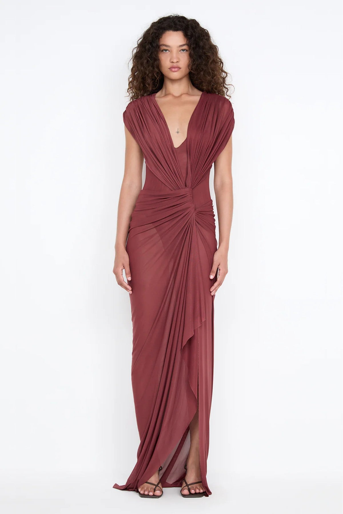 Leia Drape Maxi Dress by Bec and Bridge — a rust mesh gown with a draped twist overlay, front split, and train, perfect for formal events.