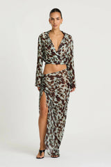 Leni Wrap Top in Motion Floral by Benni, a sheer chiffon wrap top with deep V neckline, wide sleeves, and adjustable waist tie.