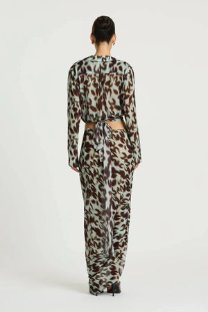 Leni Wrap Top in Motion Floral by Benni, a sheer chiffon wrap top with deep V neckline, wide sleeves, and adjustable waist tie.