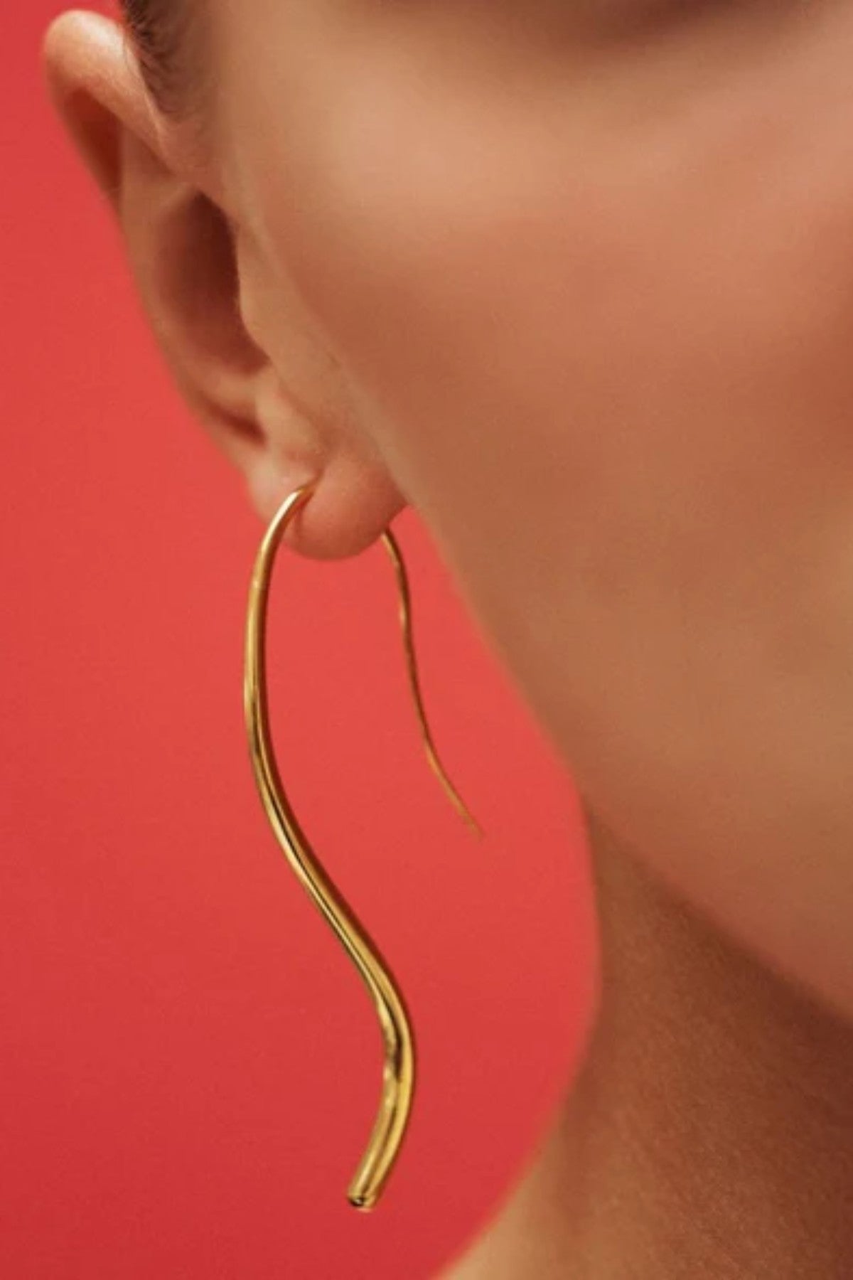 Lenora Earrings by Heaven Mayhem – gold fluid curved drop earrings that slip on without backings, perfect for refined everyday elegance.