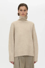 Leonie Turtleneck Knit Sweater Oatmeal Marle by Camilla and Marc – soft wool blend turtleneck with relaxed fit.