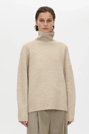 Leonie Turtleneck Knit Sweater Oatmeal Marle by Camilla and Marc – soft wool blend turtleneck with relaxed fit.