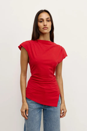 Liana Top Red by Bayse – draped cotton top with boat neckline and asymmetric hem for elevated everyday styling.