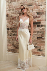 Lilah Maxi Dress Lemon by Sneaky Link – a silk-blend maxi with lace panels and fluid drape. Perfect for elegant evening events.