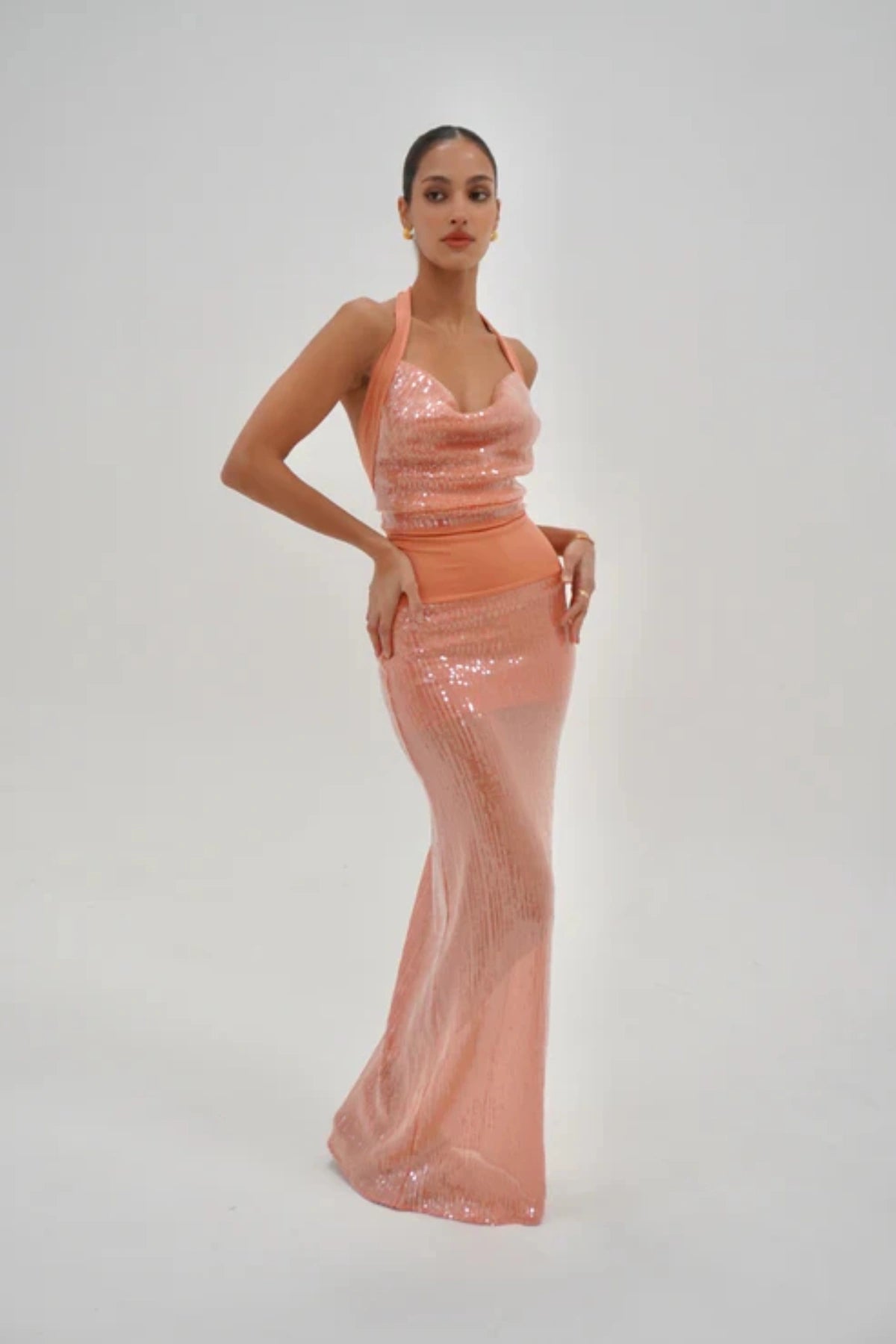 Lilou Dress Coral by Deconduarte, sequin cowl mini with adjustable ties and stretch fit, a trendy piece perfect for parties, dates or viral nights out.