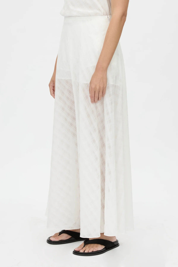 Louise Maxi Skirt by Camilla and Marc – a soft white sheer check maxi skirt with an elastic waist and detachable lining, perfect for elegant layering.