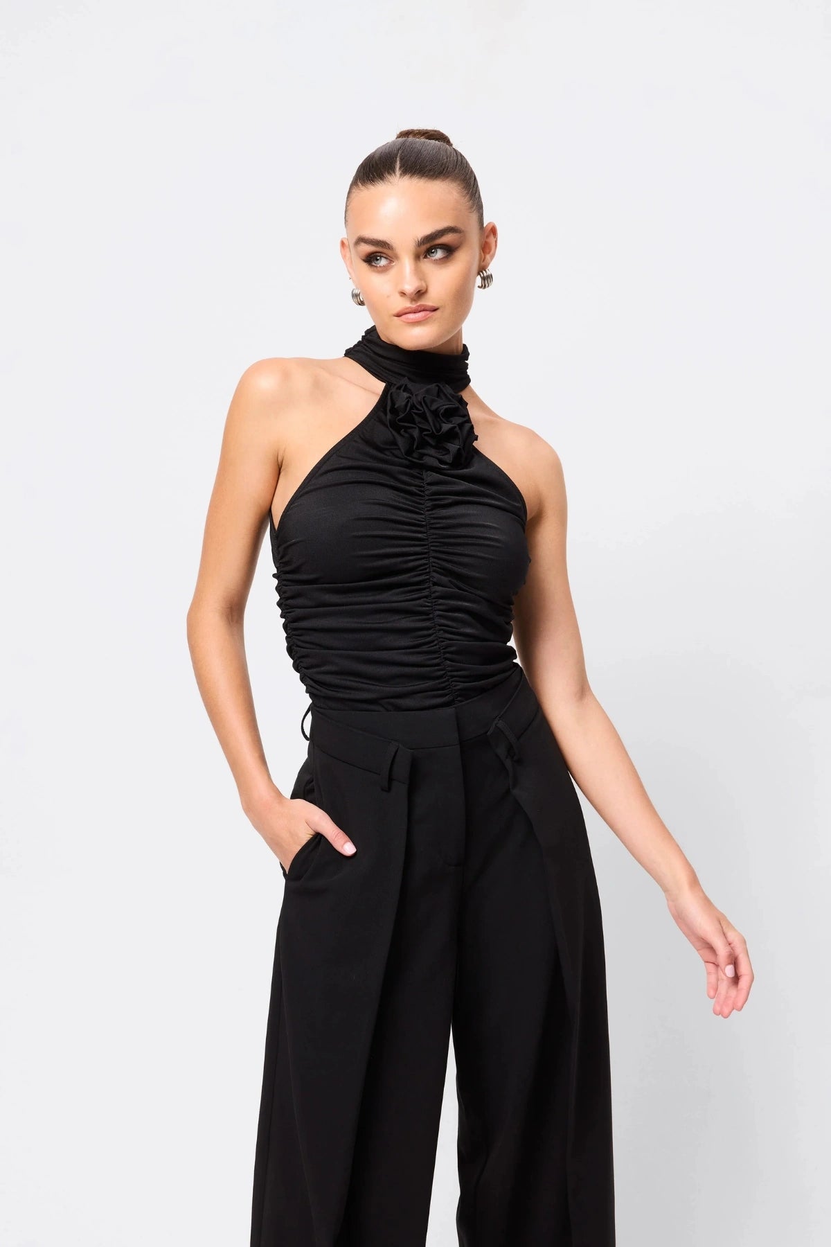 Love Again Top Black by Mossman, halter Lycra top with racerback, gathered detail and rosette accent, a trendy piece perfect for chic evenings or events.