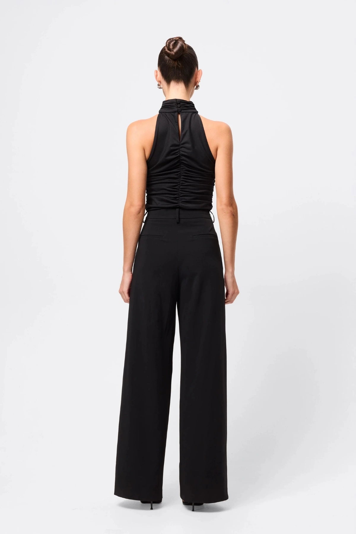 Love Again Top Black by Mossman, halter Lycra top with racerback, gathered detail and rosette accent, a trendy piece perfect for chic evenings or events.