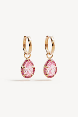 Love Without Limits Hoops by By Charlotte – 18k gold vermeil hoop earrings with pink cubic zirconia and ruby removable pendants.