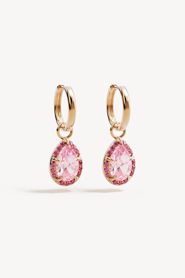 Love Without Limits Hoops by By Charlotte – 18k gold vermeil hoop earrings with pink cubic zirconia and ruby removable pendants.