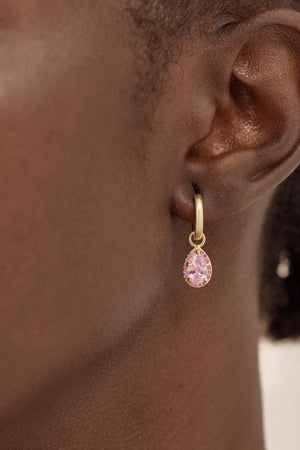 Love Without Limits Hoops by By Charlotte – 18k gold vermeil hoop earrings with pink cubic zirconia and ruby removable pendants.