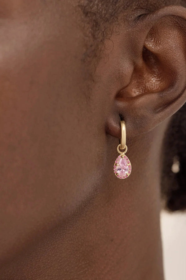 Love Without Limits Hoops by By Charlotte – 18k gold vermeil hoop earrings with pink cubic zirconia and ruby removable pendants.
