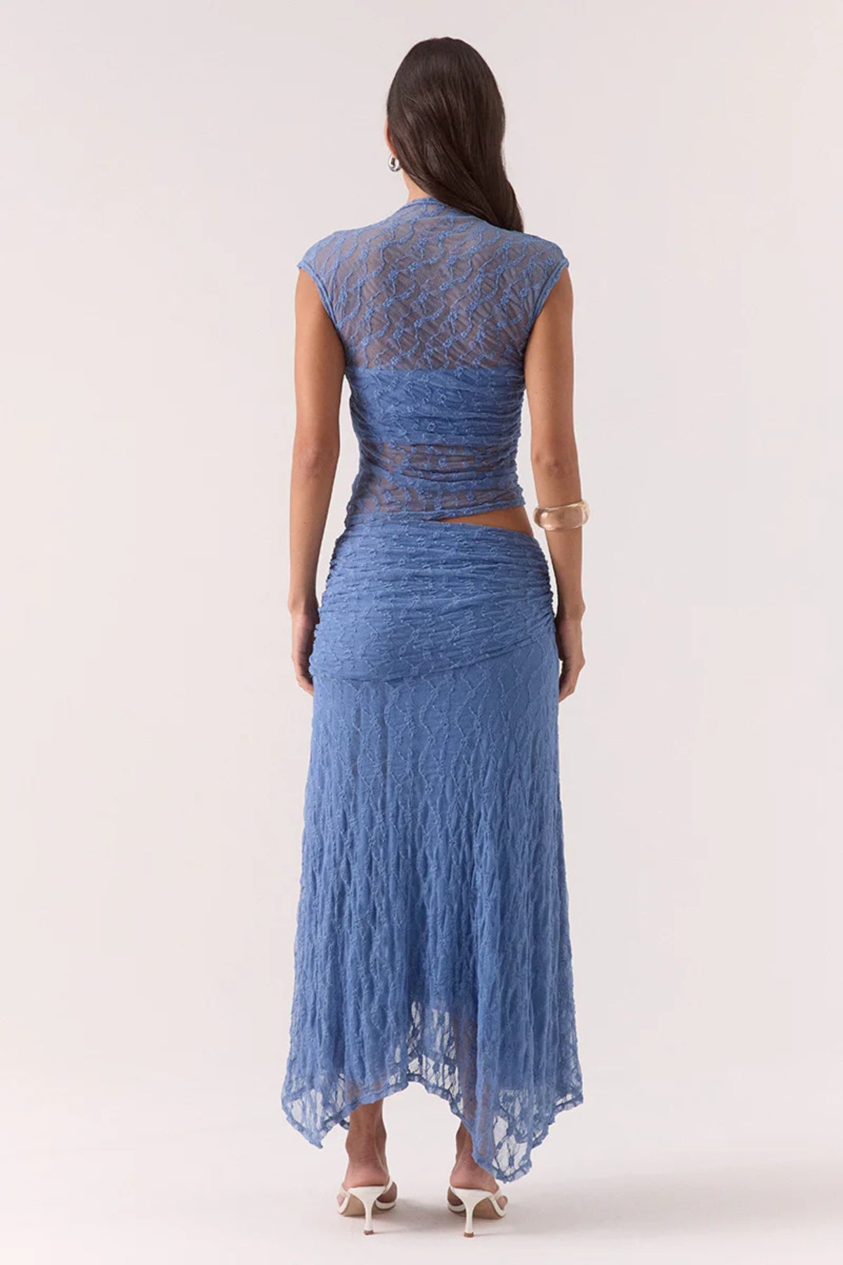 Lowri Skirt Slate Blue by Sovere, textured lace midi with asymmetric gathered waistband and handkerchief hem for soft, structured movement and effortless edge.