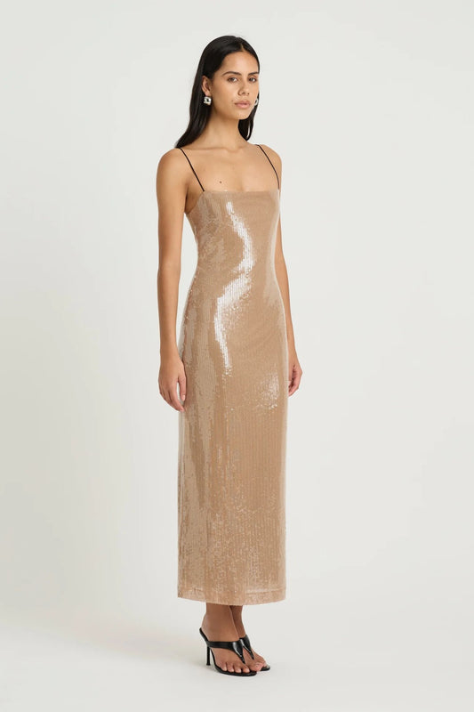 Lucca Maxi Dress by Benni, sequin maxi with liquid-effect shine and sleek black contrast straps, perfect for elegant evening celebrations.