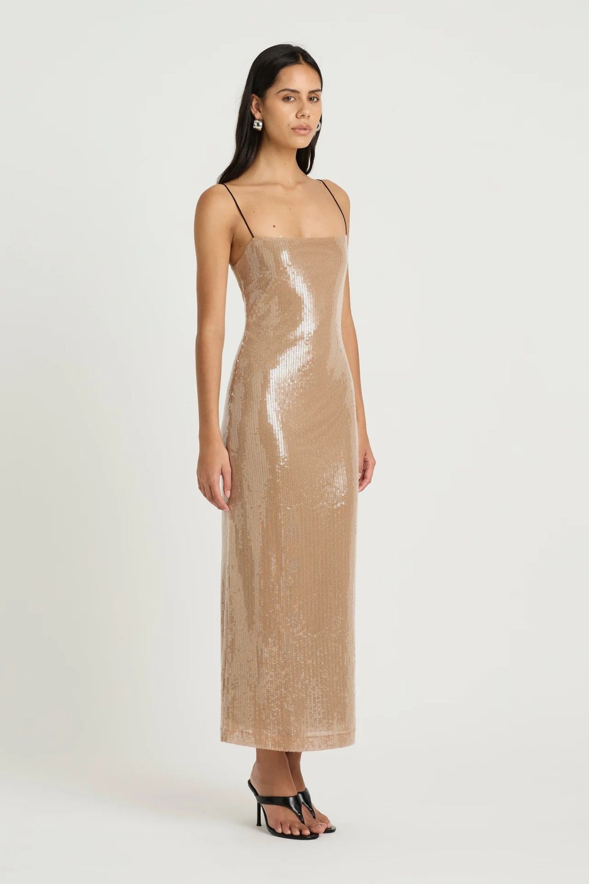 Lucca Maxi Dress by Benni, sequin maxi with liquid-effect shine and sleek black contrast straps, perfect for elegant evening celebrations.